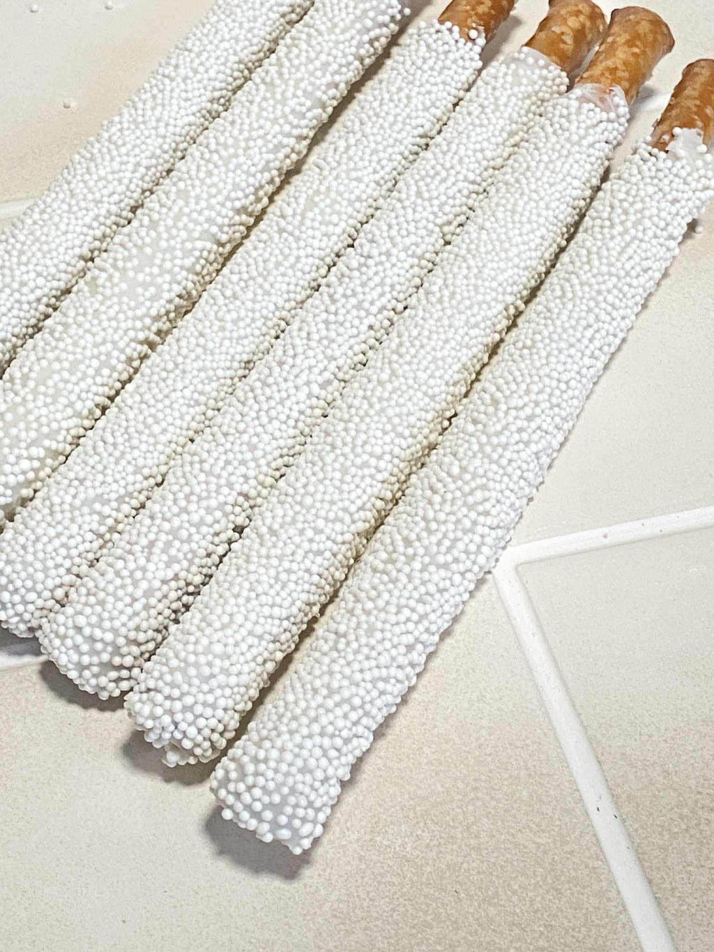White Chocolate Covered Pretzel Rods: one dozen
